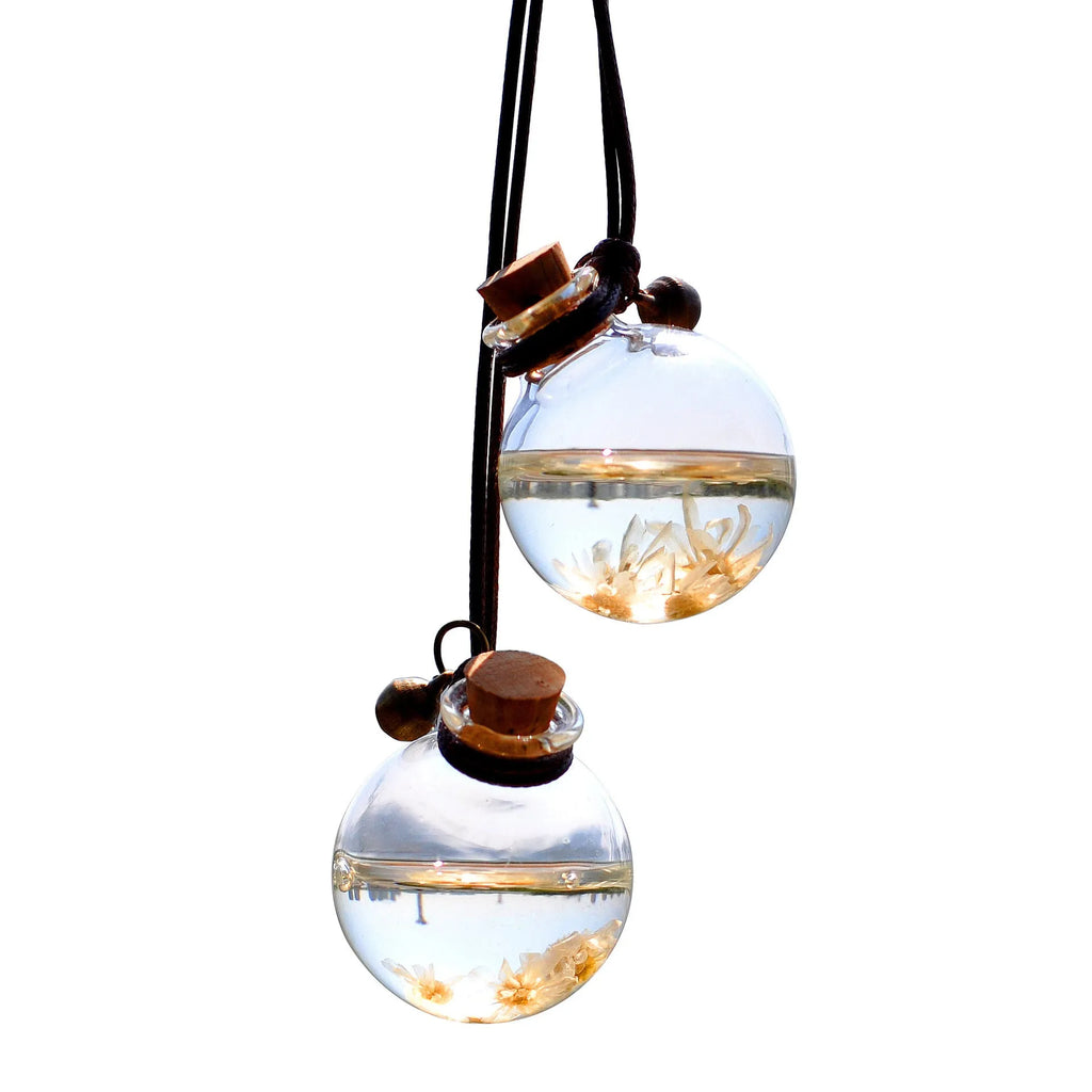 Glass preserved flower car pendant in fire extinguisher shape with pink hydrangea blooms, 28mm diameter
