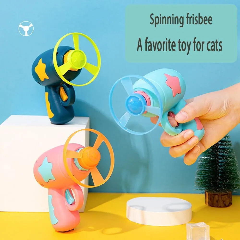 Blue cat toy gun with flying Frisbee for indoor feline hunting simulation games