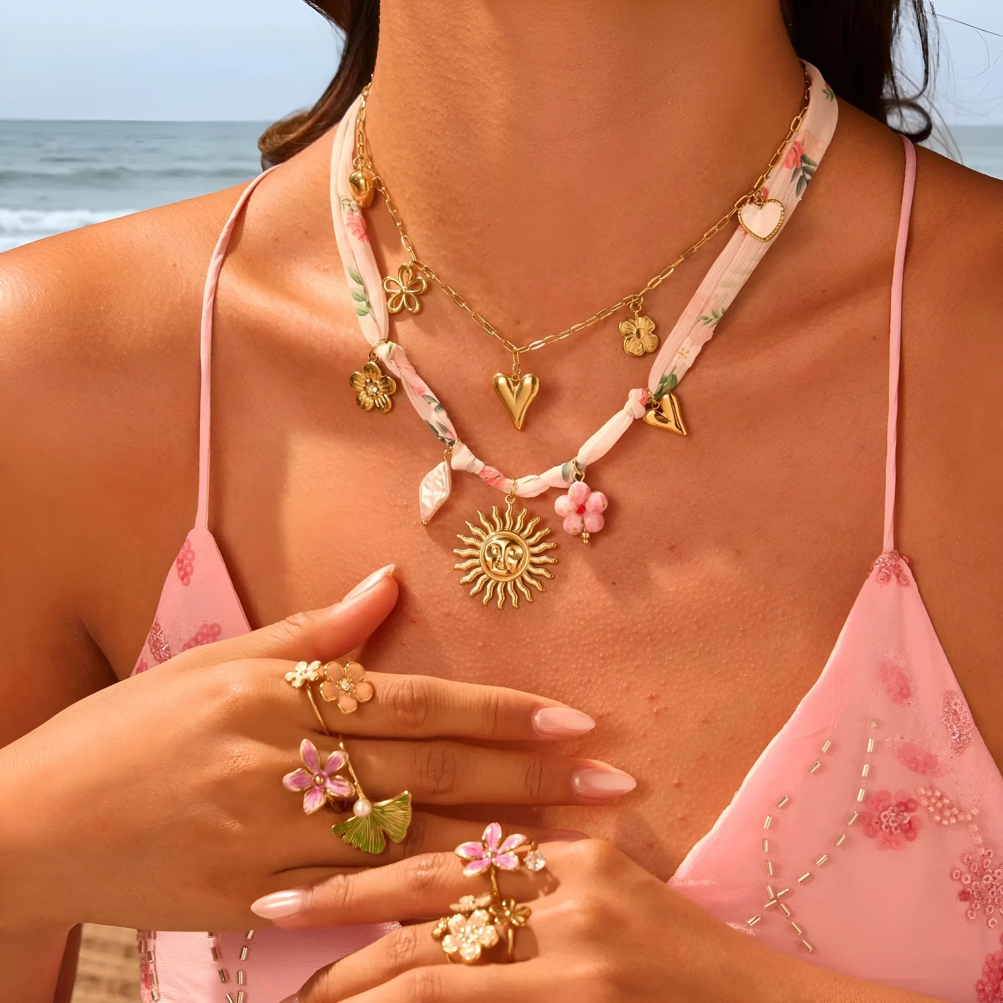 Women's stainless steel necklace with geometric sun pendant on adjustable 41-50cm chain
