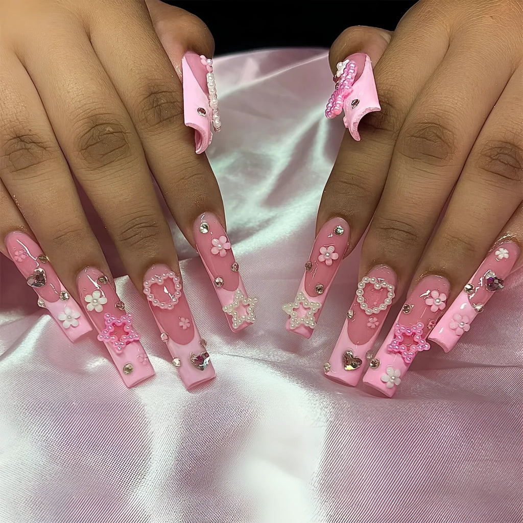 Super long pointed water pipe style false nails with French tip, love heart and bow design in colour XB-70-48.