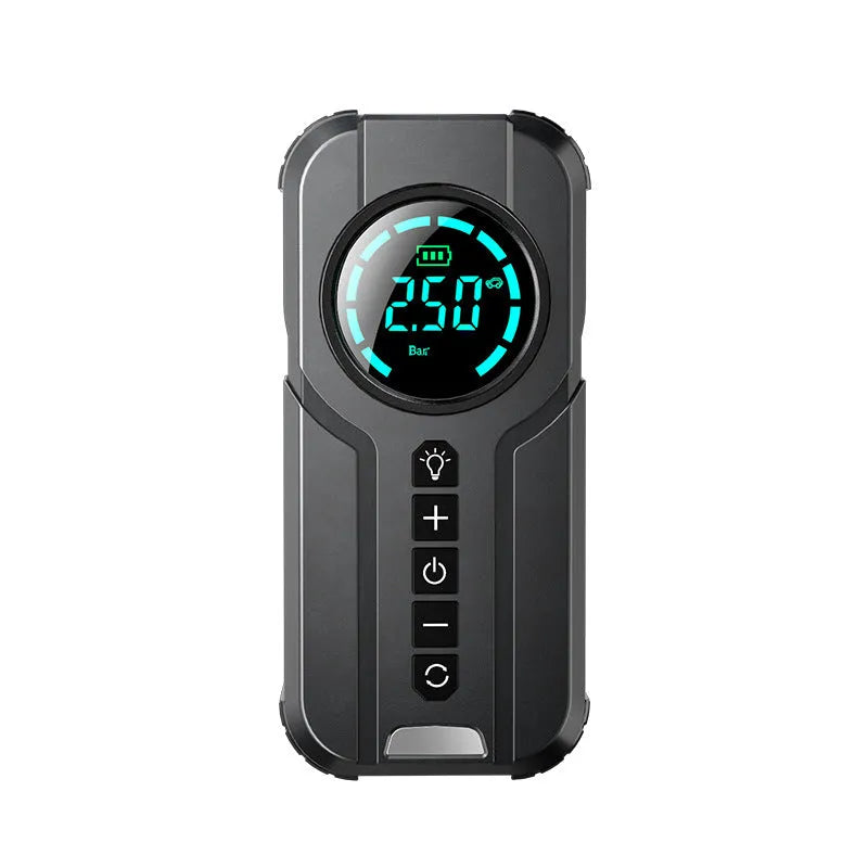 Portable wireless car air pump with battery, 12V cable, and nozzle kit on grey background