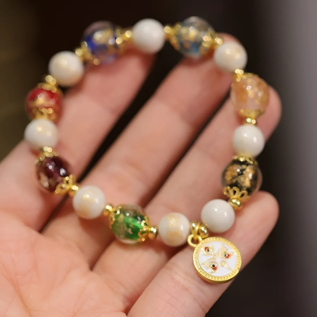 Handmade Fragrant Gray glass bracelet with 10mm geometric beads in God of Wealth design, five colours