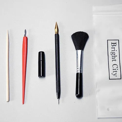 Scrape painting art tools set with healing pens, brushes, photo frames and creative supplies for texture painting projects