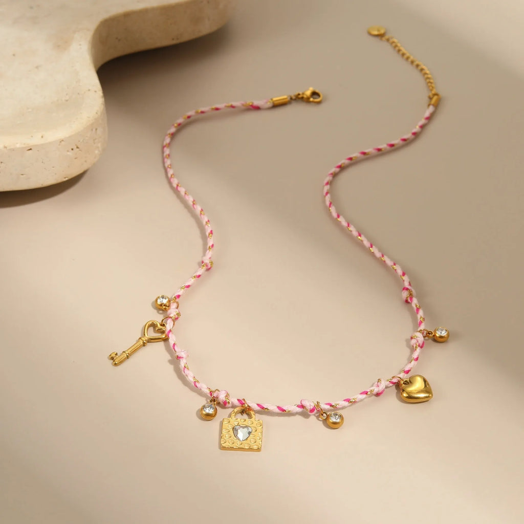 Handmade braided rope titanium steel necklace or bracelet with 18K gold electroplating in purple, pink, or blue styles.