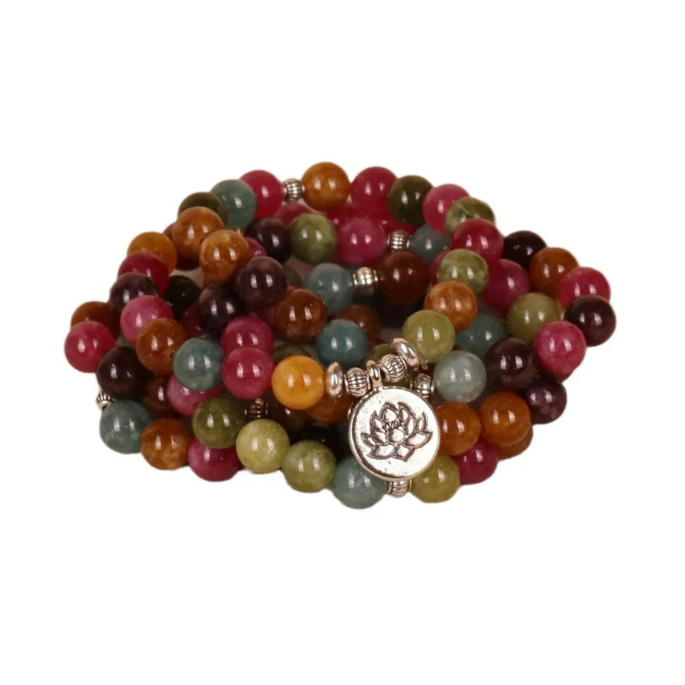 Tourmaline coloured 108-bead alloy bracelet with multi-layer lotus hanging design on adjustable string.