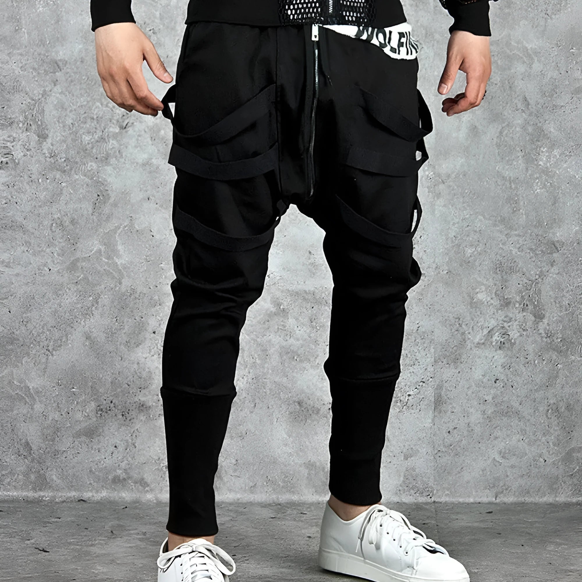 Low crotch cross pants for men in black with tapered leg and small foot opening