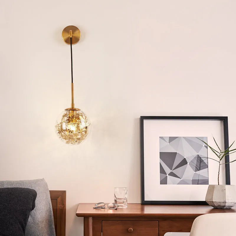 Modern glass bedside wall lamp in golden flower finish with 20cm diameter
