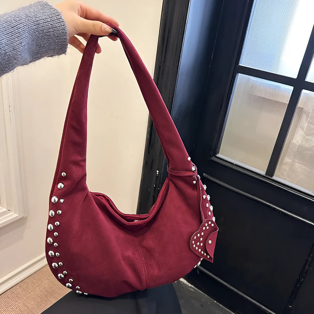Soft plush underarm tote handbag for women in a strapless retro design, shown in multiple colour options.