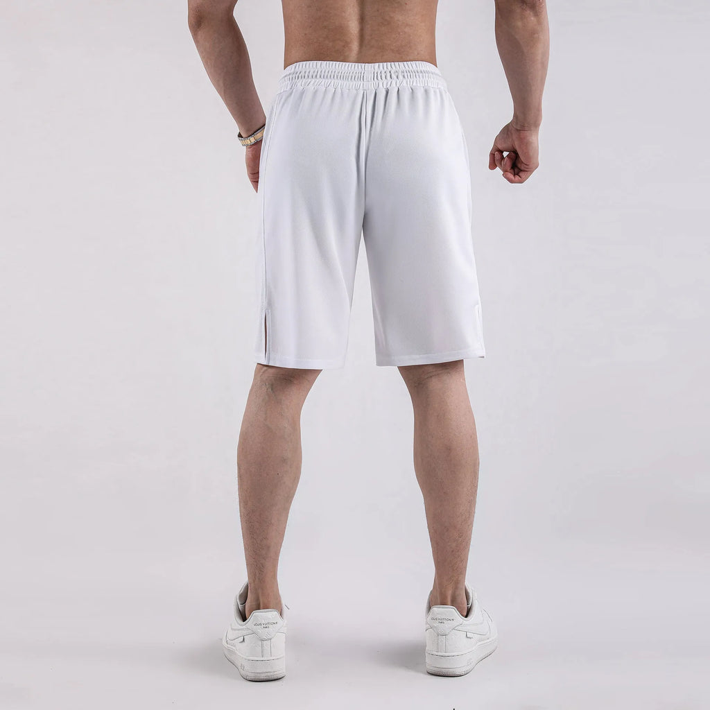 Men's black quick-dry mesh fitness shorts with elastic waistband laid flat.