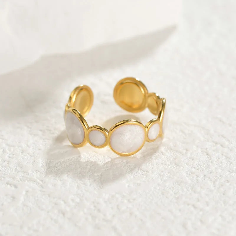 Geometric stainless steel ring with adjustable opening and electroplated finish