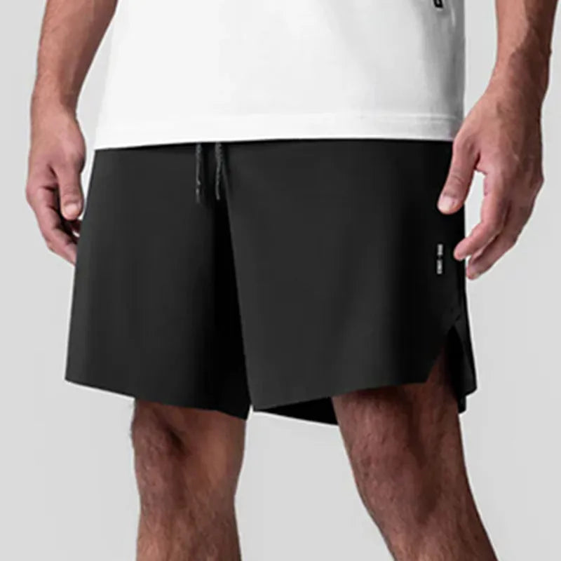 Men's seamless quick-drying sports shorts in black with multi-bag design, shown straight-leg cut