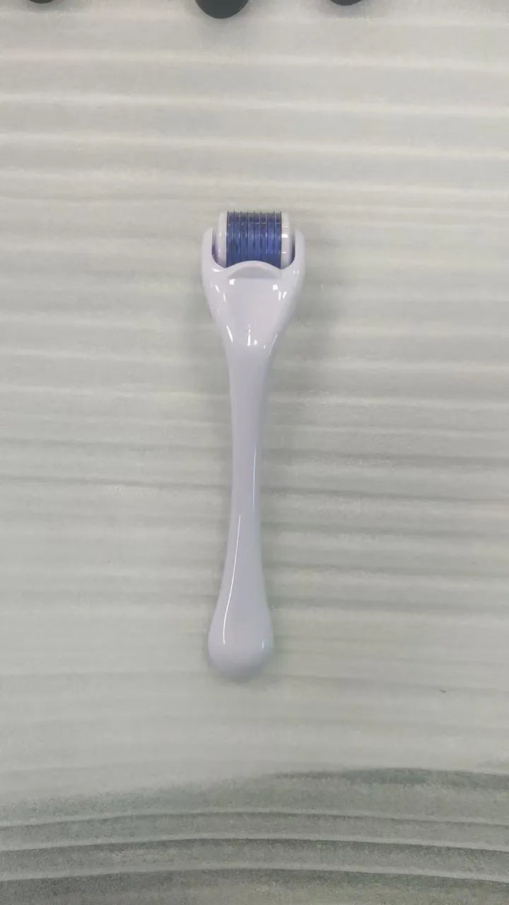 540 needle derma roller with black handle and coloured wheel, showing 0.25mm 0.3mm size options for micro-needling.