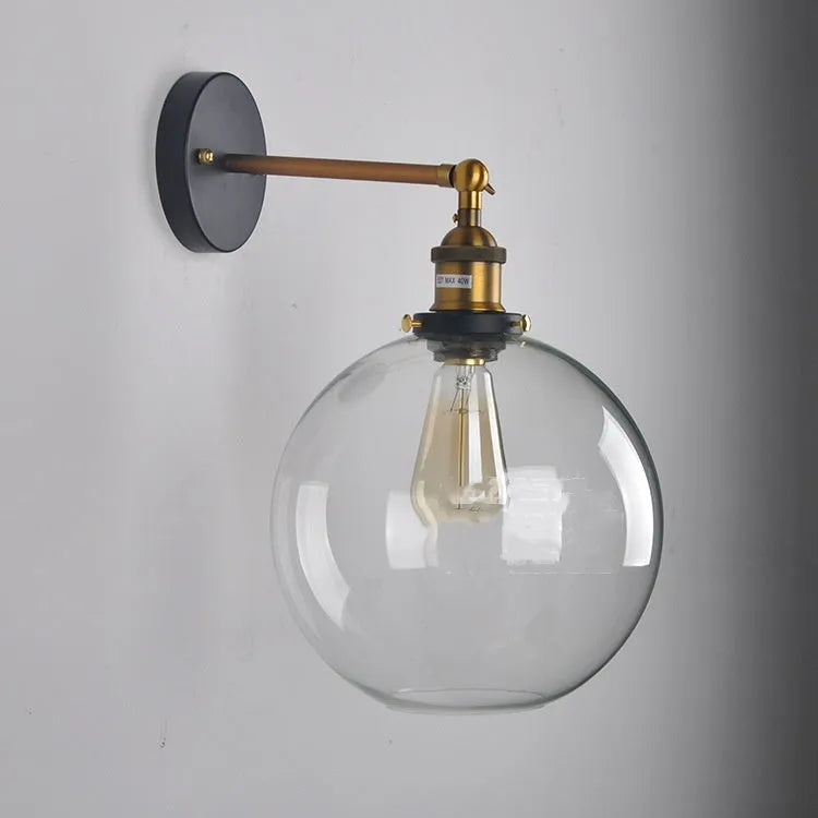 Retro round ball glass wall lamp with aluminium holder in amber, smoke grey, or transparent colour