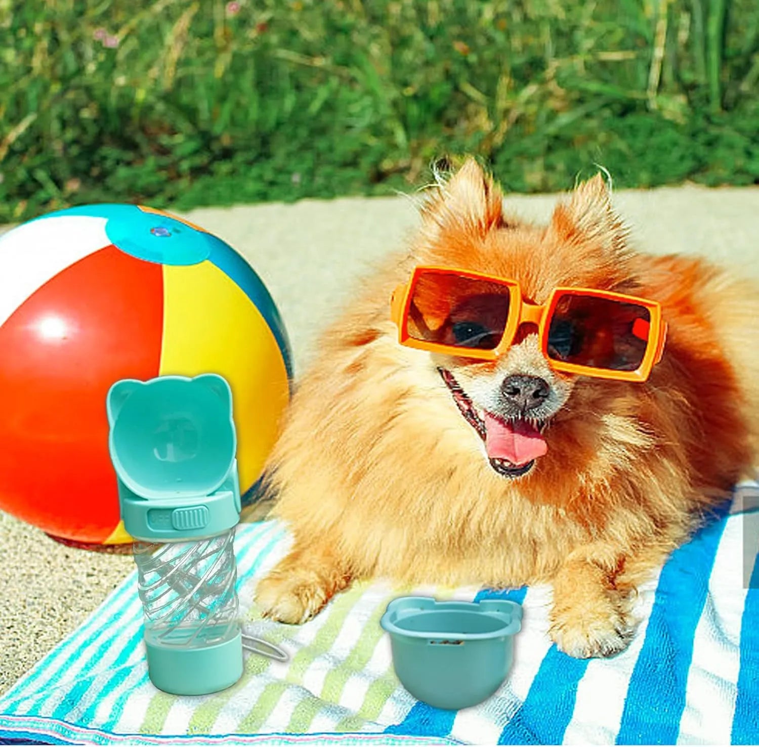 Green 3-in-1 portable pet water bottle with strap, showing water bowl, food container, and bag dispenser.