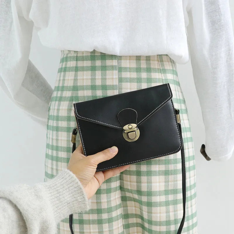 Retro fashion shoulder messenger bag with lock detail, cross square shape, in wine red colour