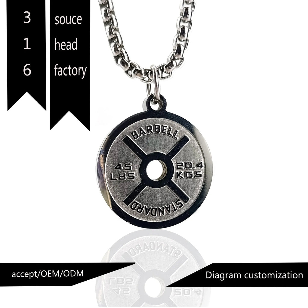 Polished stainless steel barbell disc pendant on a 60cm chain, showing geometric fitness jewellery design.