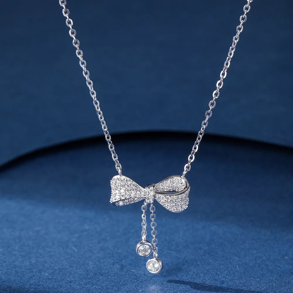 Women's sterling silver bow pendant necklace with O-ring chain, 40-45cm adjustable length