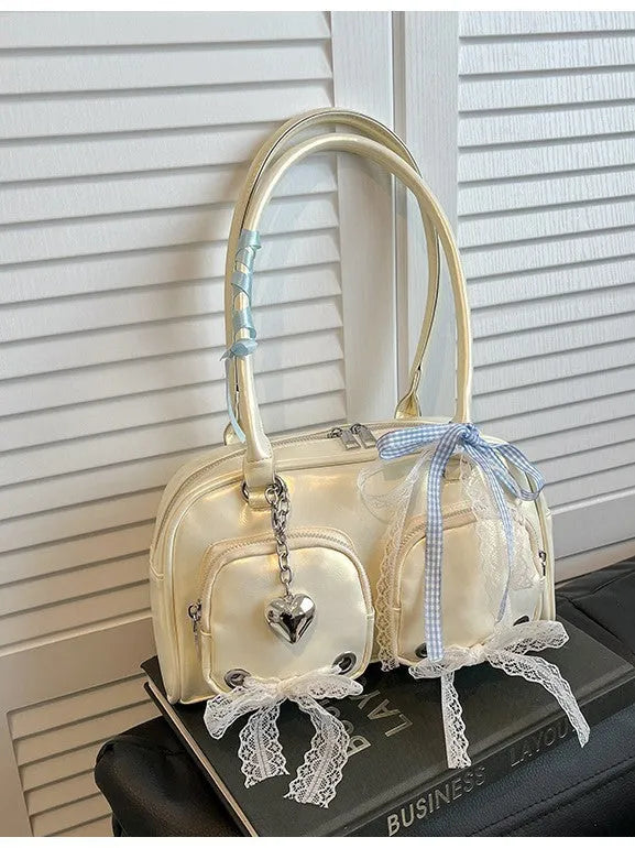 Horizontal square PU leather shoulder bag with double straps and interior phone compartment in beige colour