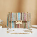 Women's straw cross-body bag in horizontal square shape, rainbow colour, with lock closure and single shoulder strap