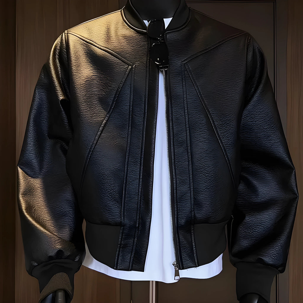 Men's black slim-fit PU leather jacket with extended 100cm length shown on model
