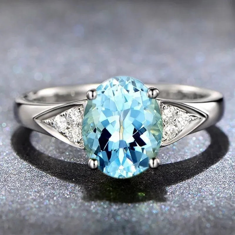 Ladies court style ring with natural zircon inlay showing heart, water drop, and bell pattern designs
