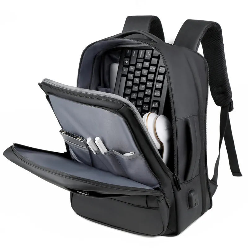 Large capacity black backpack for business travel and outdoor use with curved shoulder straps