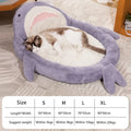 Blue shark pattern pet bed for dogs and cats with raised sides and non-slip base.