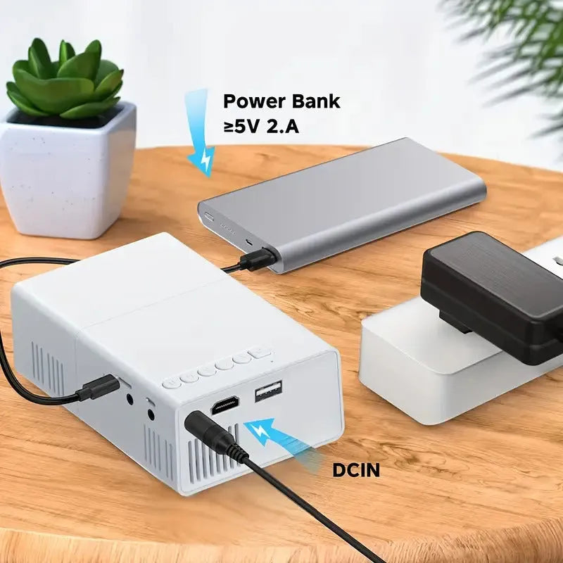 M100 mini home projector in white or black colour with remote control and cables