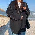 Women's black knitted cardigan top coat with long sleeves and loose fit