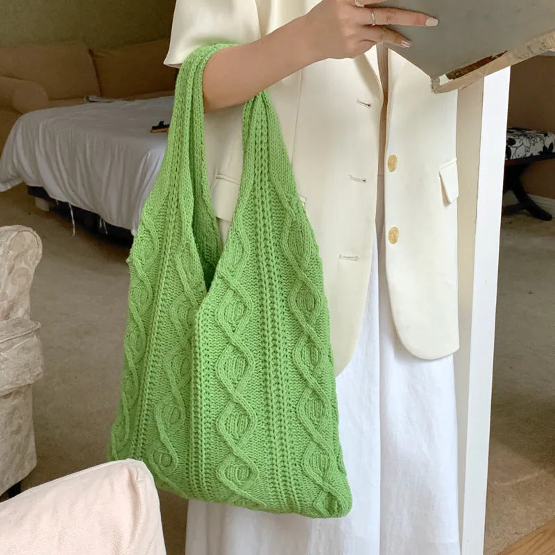 Retro hollow-knitted women's shoulder tote bag in a solid colour with double straps.