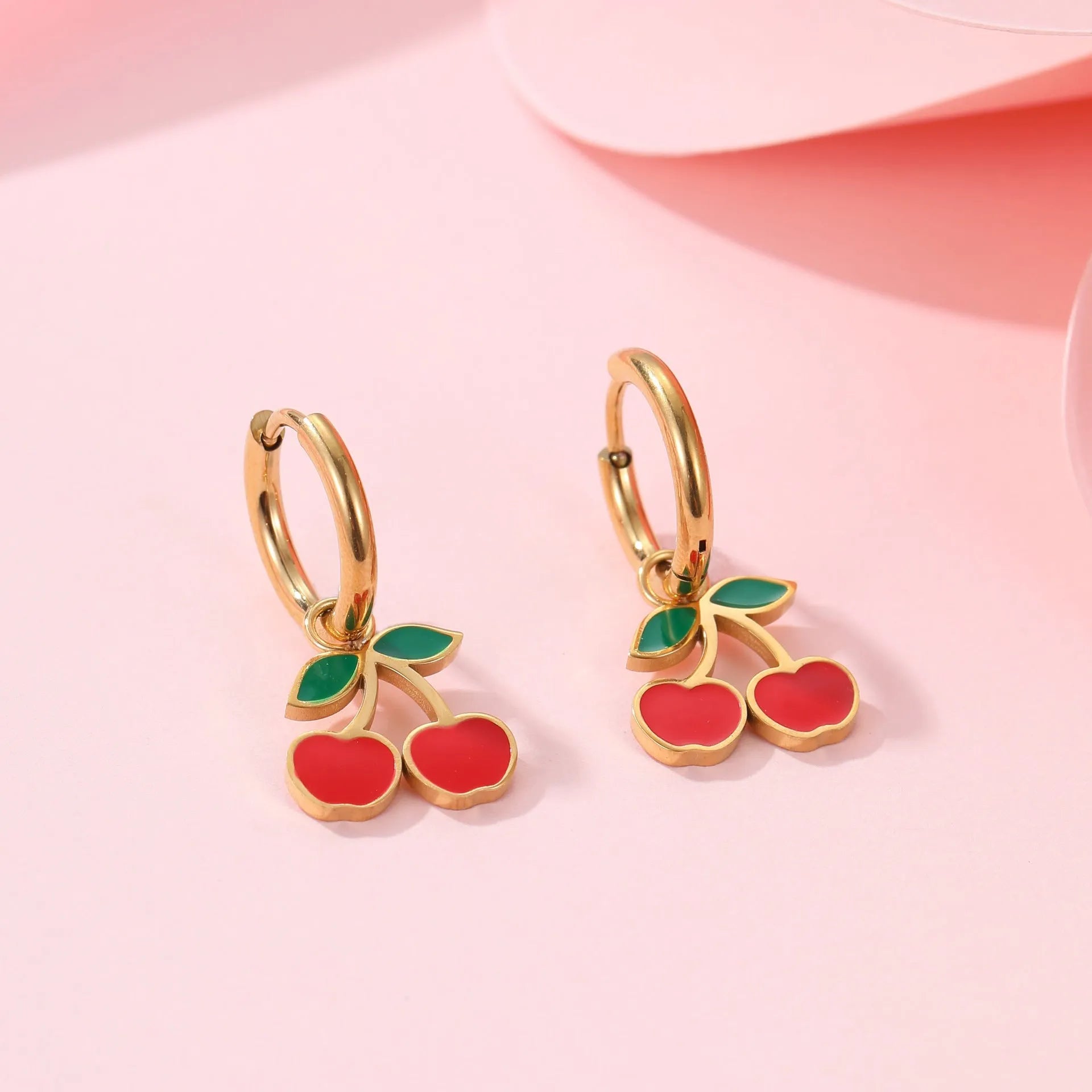 Complete cherry jewellery set with stainless steel necklace, bracelet, earrings, and ring featuring 18K electroplating