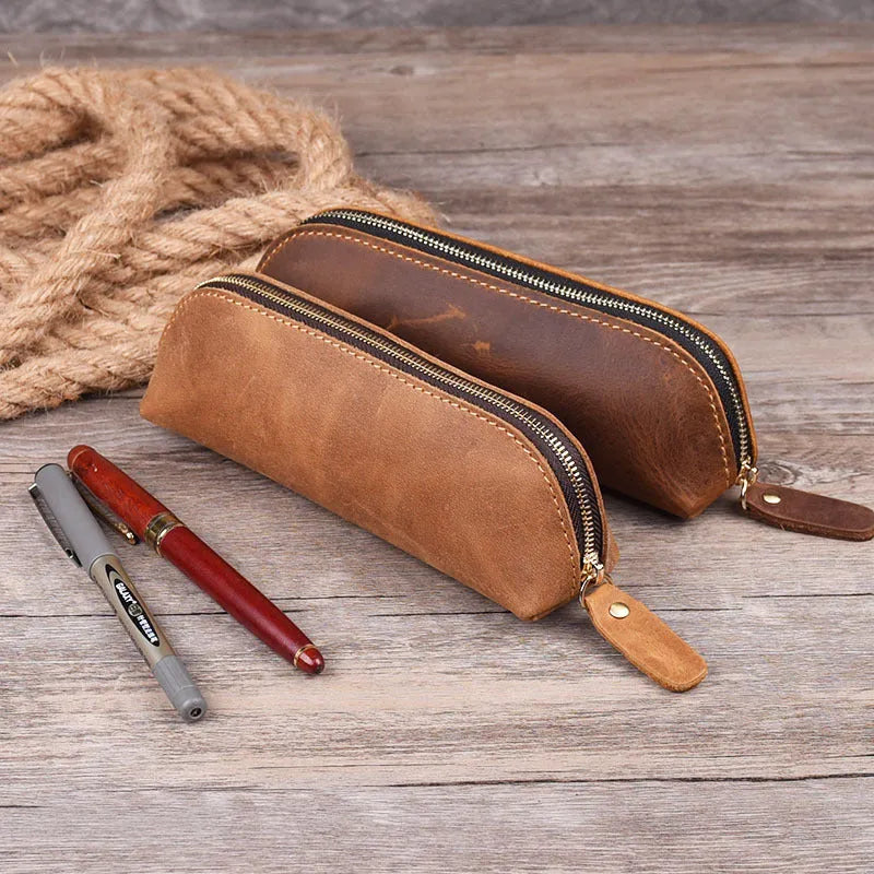 Genuine cowhide leather pencil case with zipper closure showing black colour option