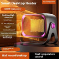 White desktop ceramic fan heater with rotatable base on a wooden table.