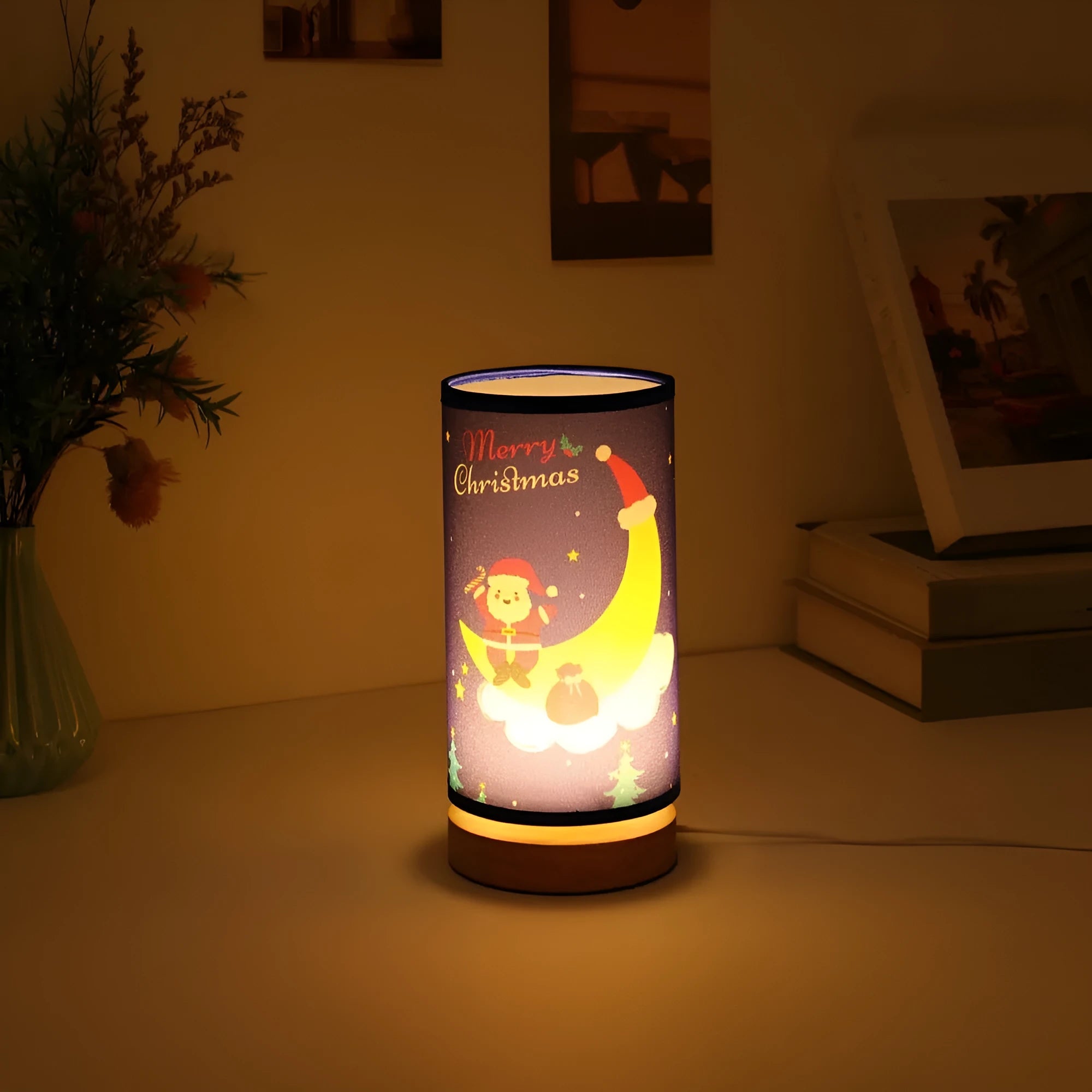 Moon Santa Claus design LED night light with bamboo base and USB plug.