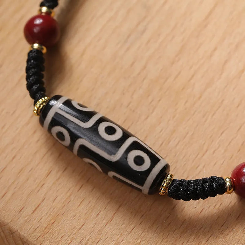 Men's shrinkable Tibetan agate dzi bead bracelet with original design, brown and white agate beads on wrist