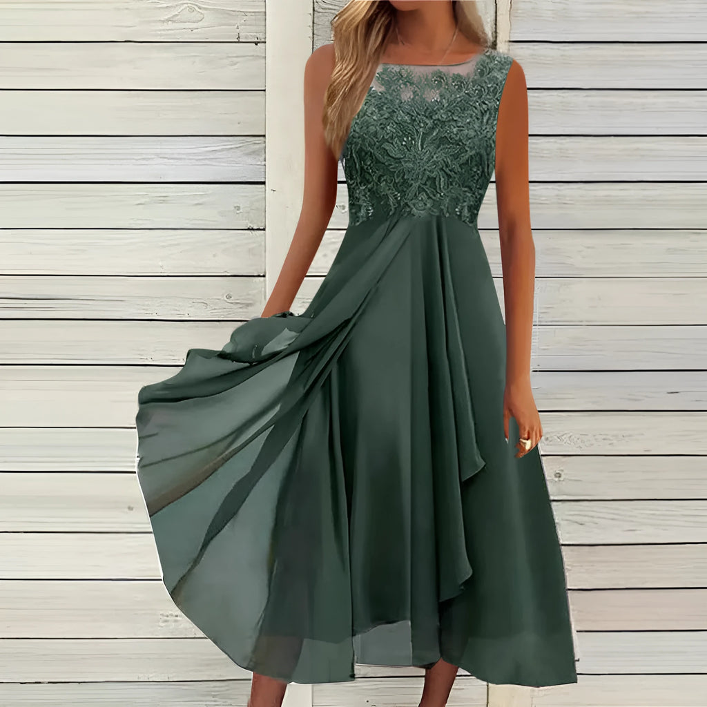 Women's sleeveless green chiffon dress with lace detailing and a mid-length skirt.
