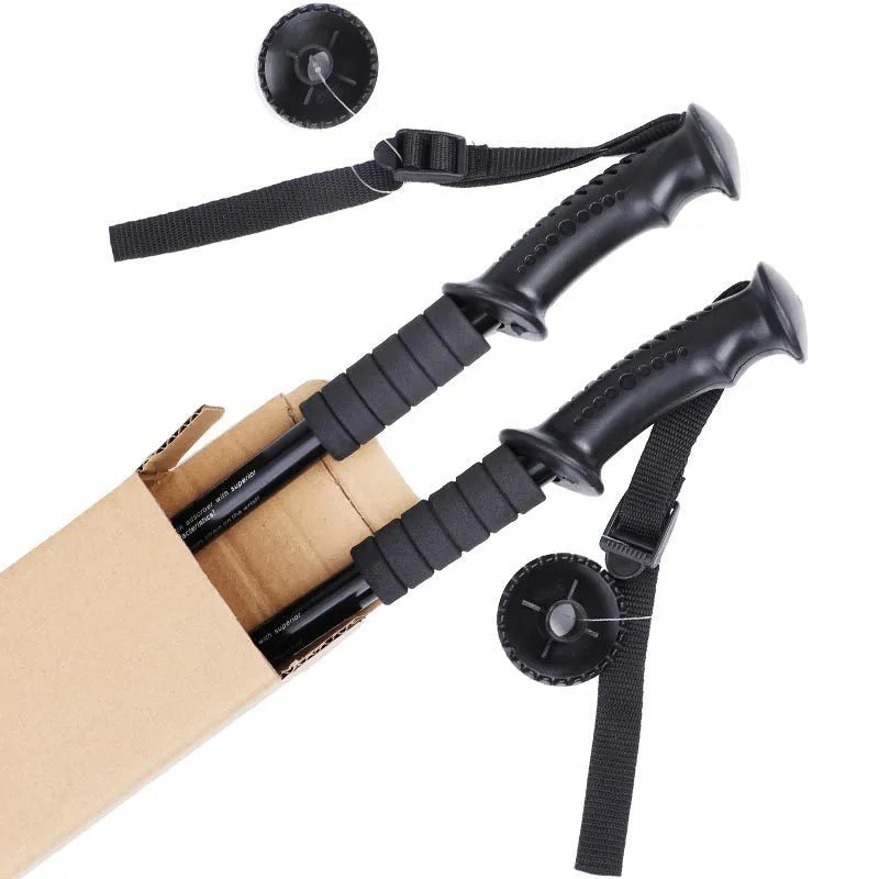 Aluminium alloy trekking poles adjustable 65-135cm with mud supports and snow holders on a mountain trail