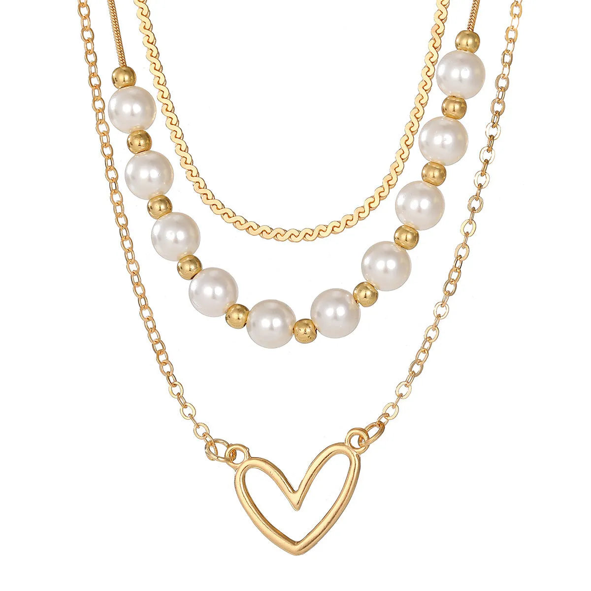 Vintage gold necklace with heart pendant on pearl chain showing adjustable length mechanism