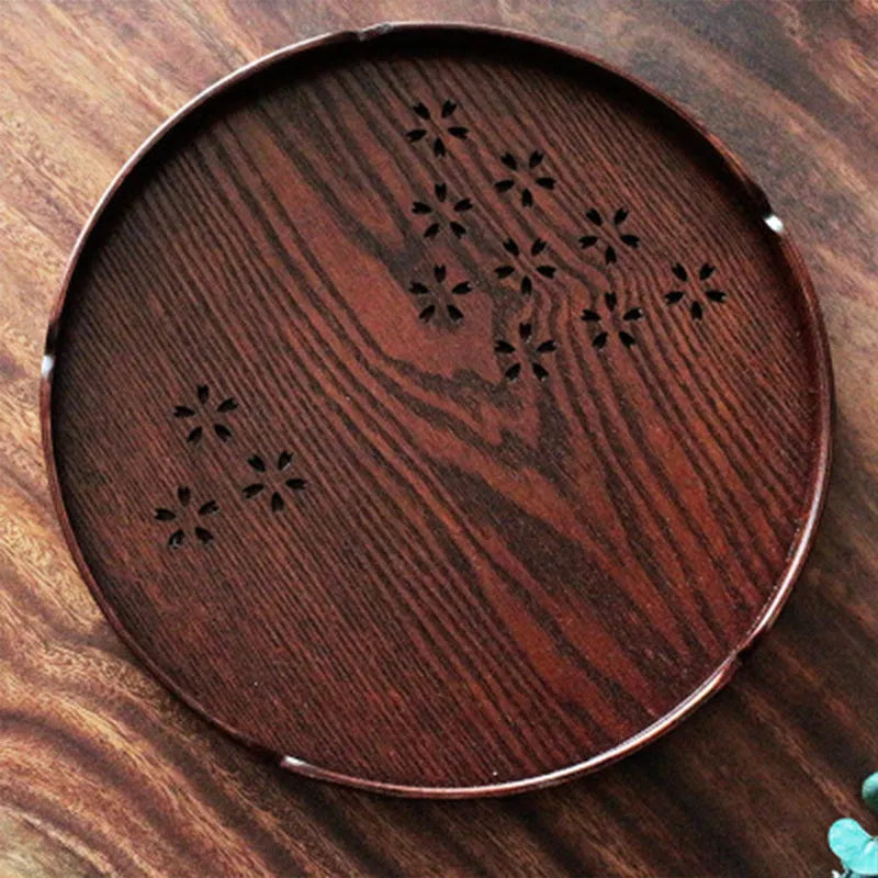 Wooden shallow plate with cherry blossom cut-out design, 30cm diameter.