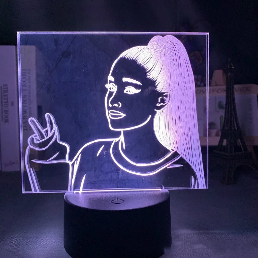 Slim European style acrylic 3D LED night light on a colourful black base, showing remote control.