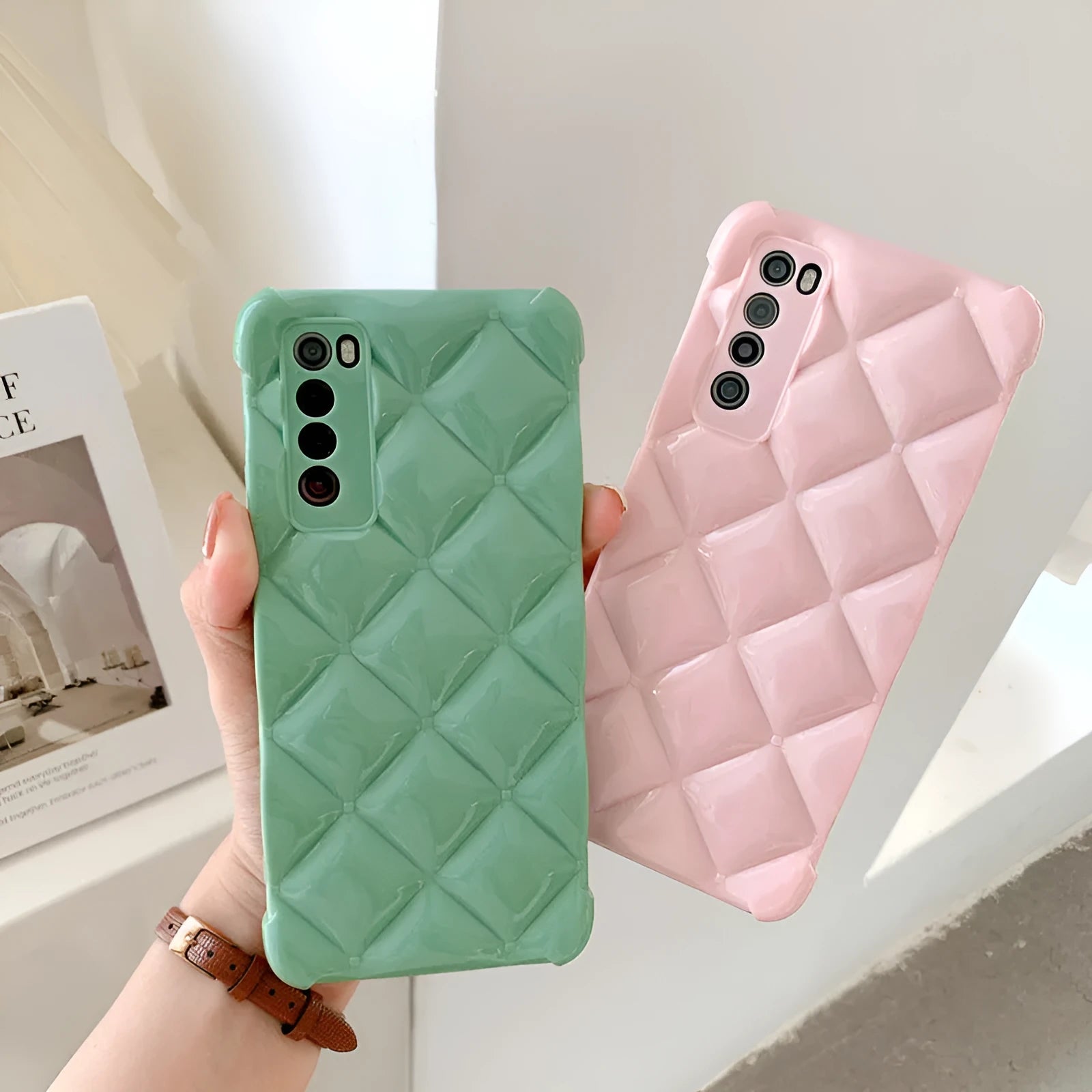 Black silicone diamond pattern phone case for a Huawei smartphone on a white background.