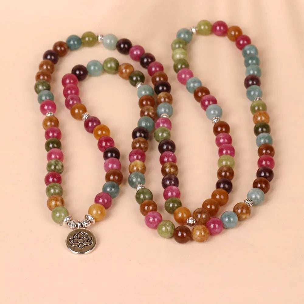 Tourmaline coloured 108-bead alloy bracelet with multi-layer lotus hanging design on adjustable string.