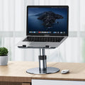Silver adjustable car laptop stand with height adjustment and rotating base on vehicle seat