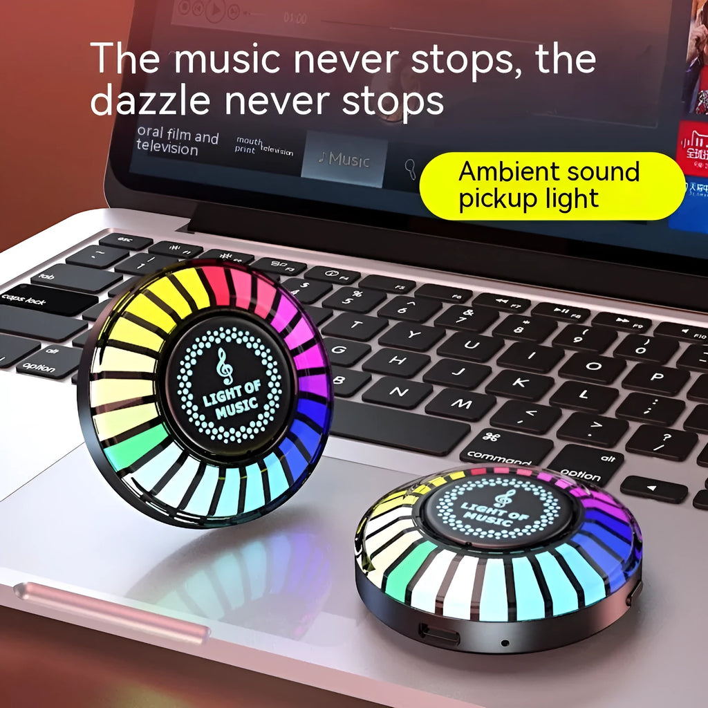 Desktop magnetic RGB pickup ambience light in black with ABS housing on car dashboard