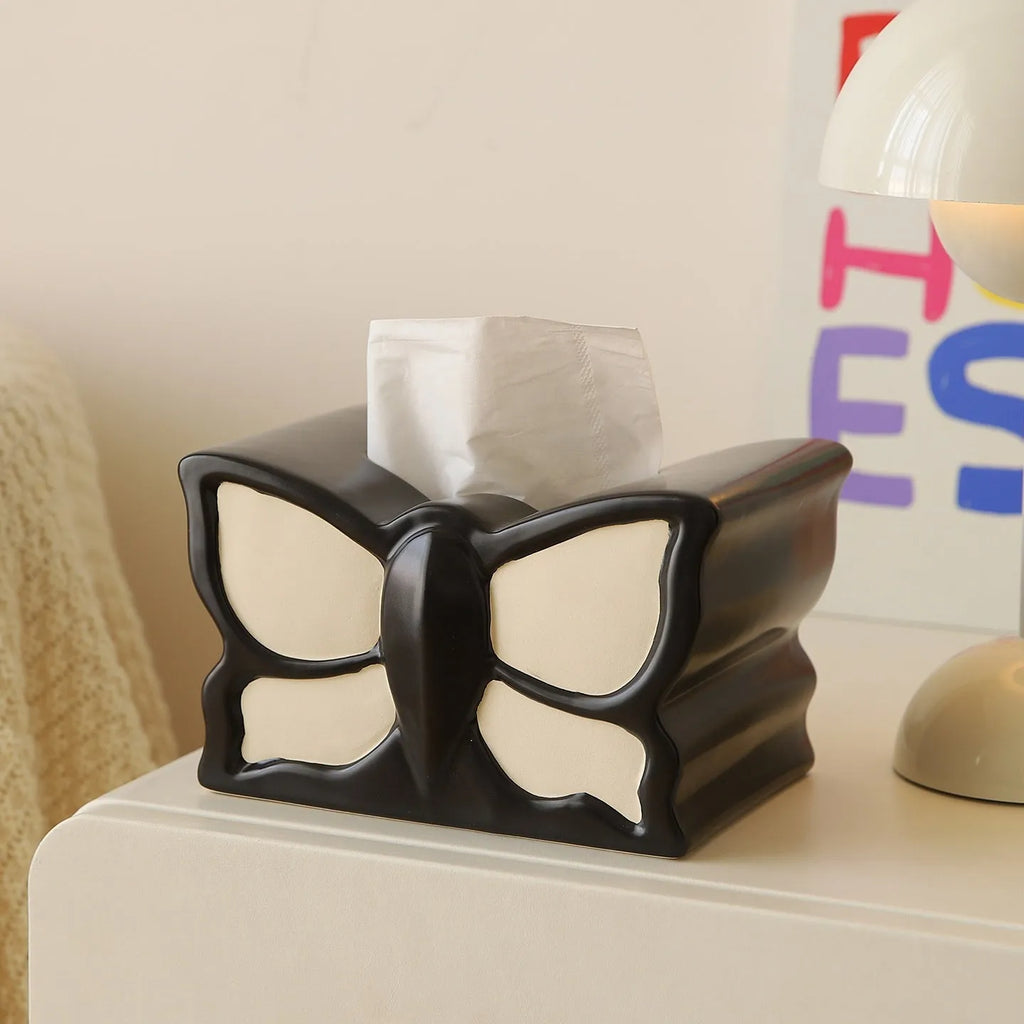 Ceramic light luxury butterfly tissue box and vase set on a living room side table
