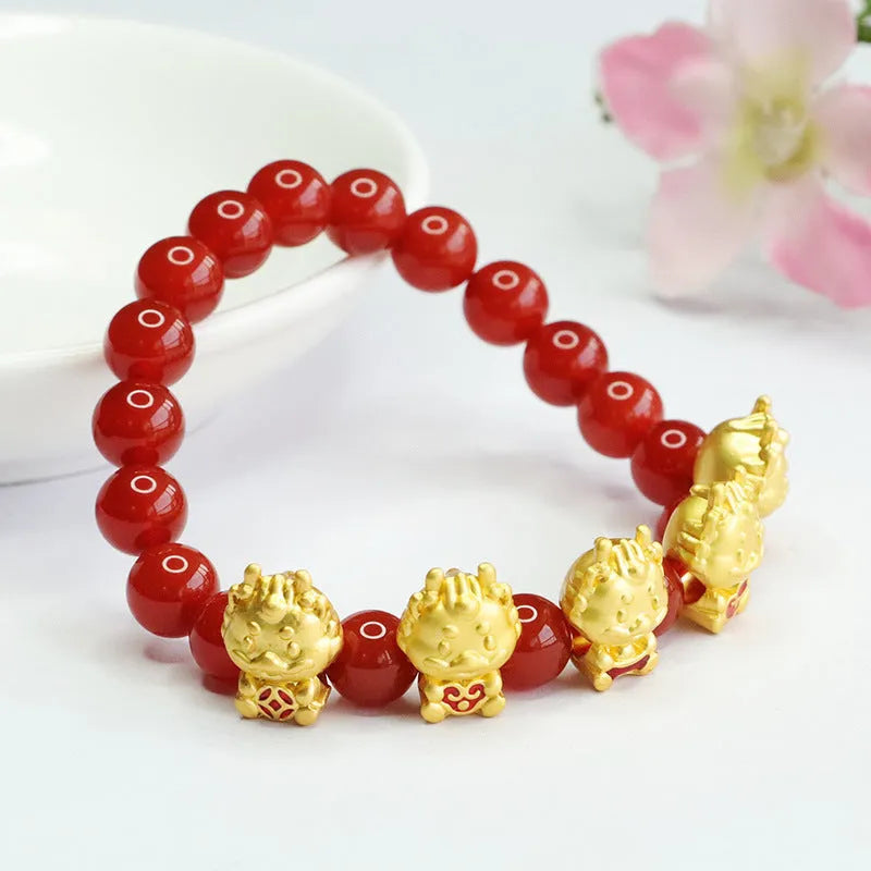 Red agate bracelet with detailed dragon carving on an 8mm bead.