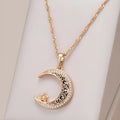Rose gold star and moon necklace with zircon and enamel pendant on a water wave chain.