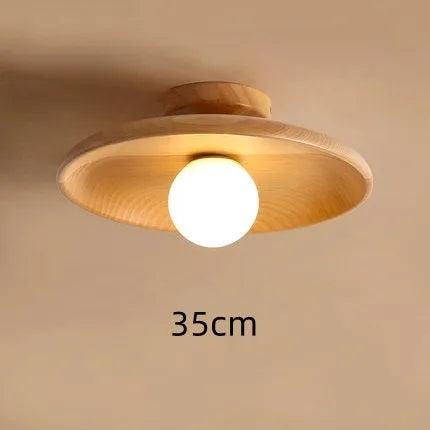 Modern solid wood ceiling lamp with glass shade in light wood and walnut colour finishes.