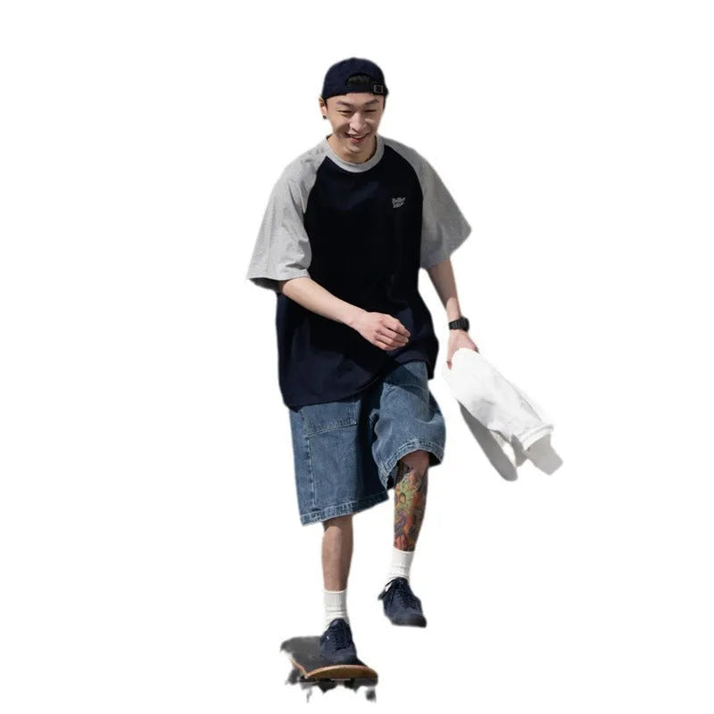 Blue loose-fit men's T-shirt with raglan sleeves in a Japanese Junior casual style.