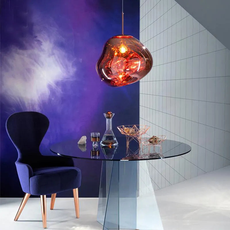 Irregular shaped glass LED chandelier in a metallic finish, showing Nordic post-modern design.